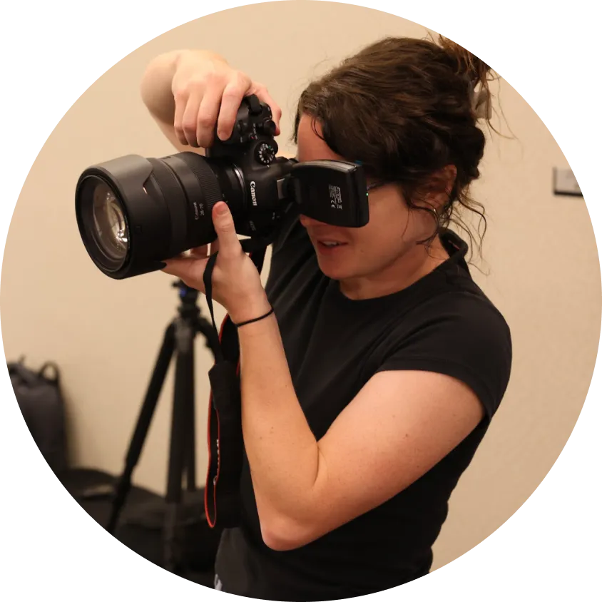 Britinee filming social media content with a camera