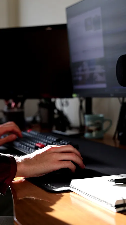 Close up of Kevin working on a website